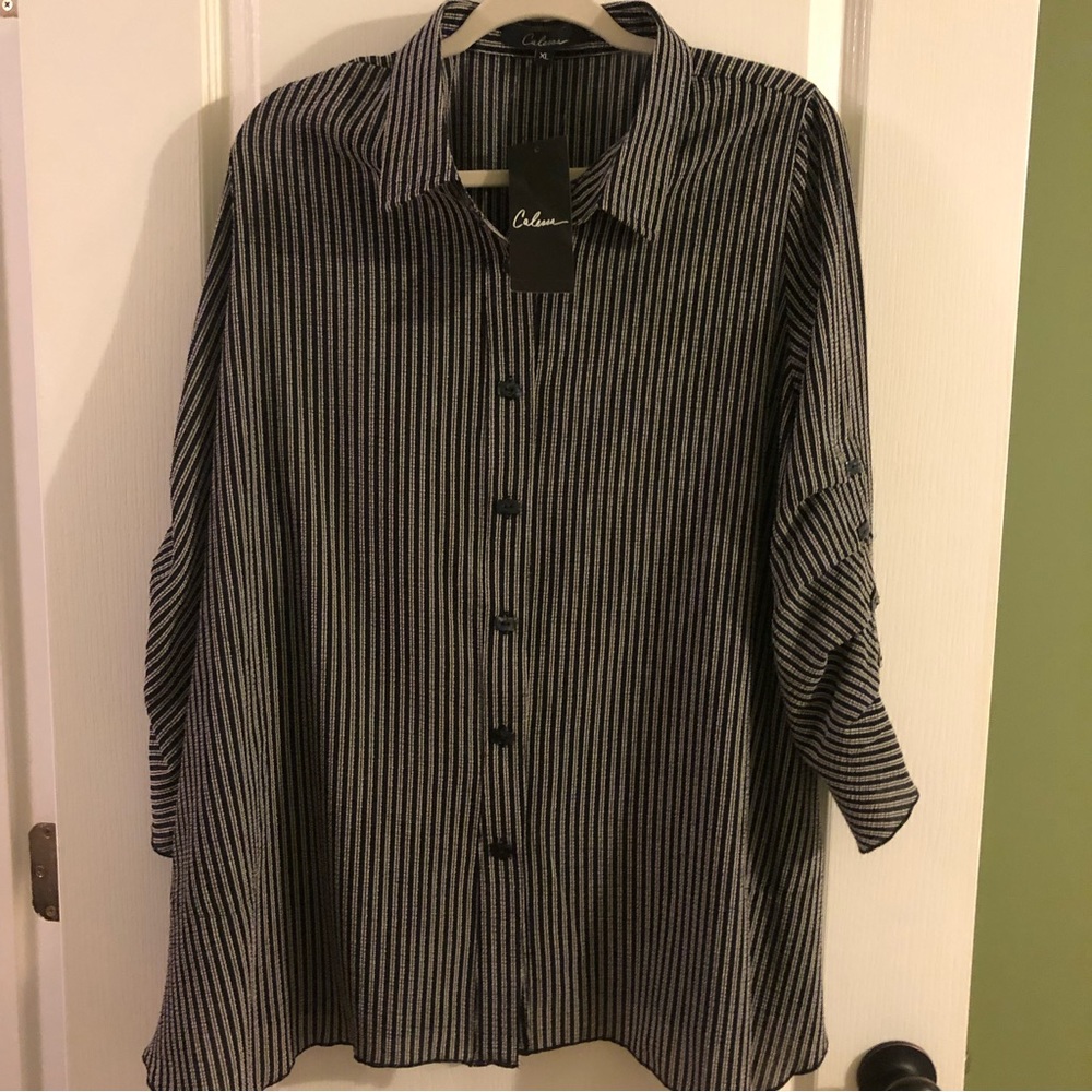 Black and white striped, buttons up, collared tunic